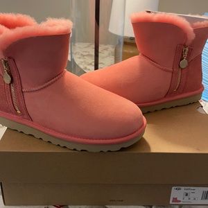 Ugg NWT Bailey zip mini pink boots.